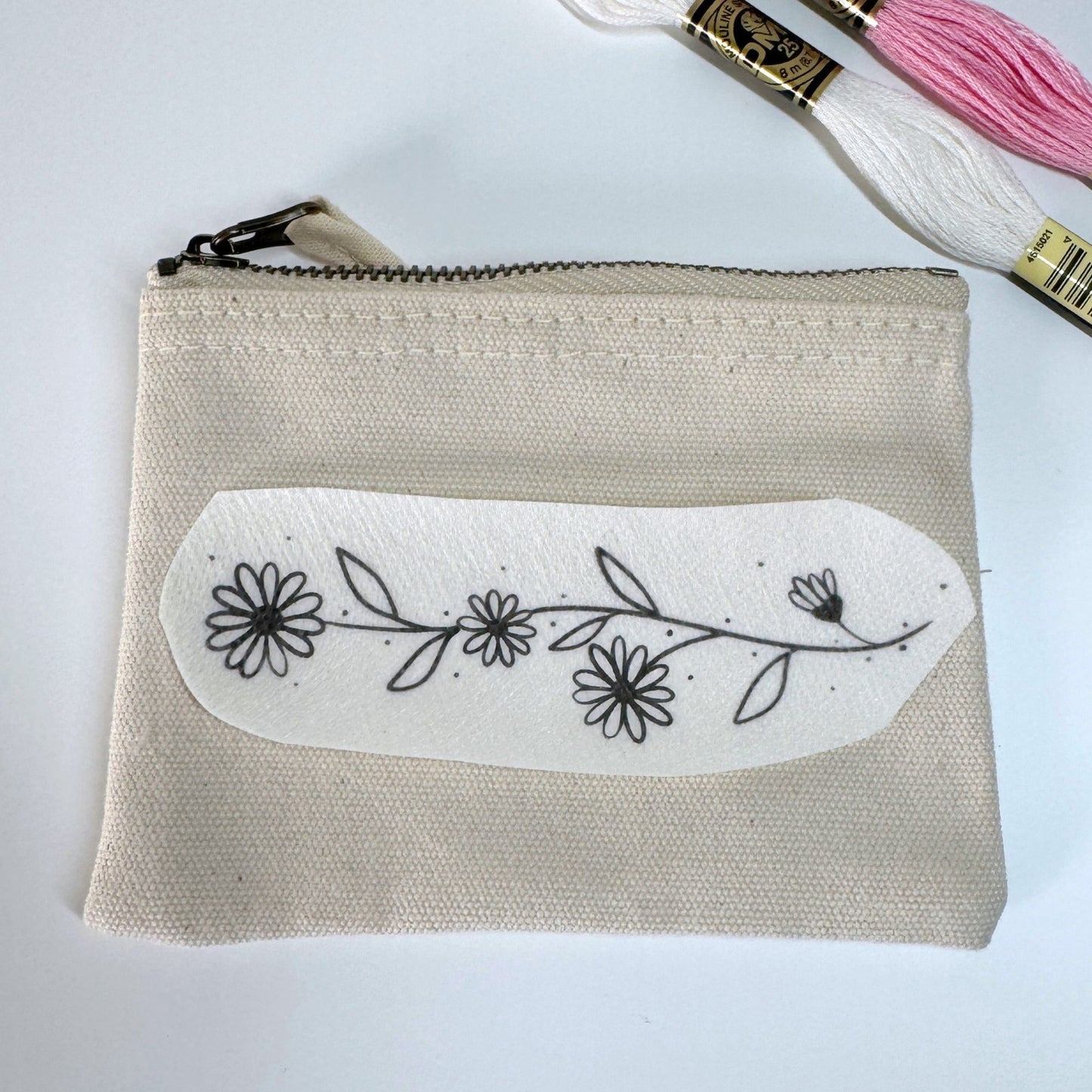Täschchen mit Gänseblümchen Sticker